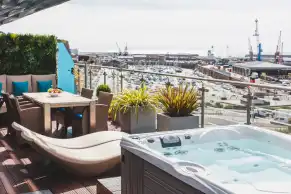 Terrace seating and hot tub with view